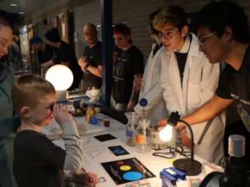 UM Astronomy Graduate Students at Outreach Event 